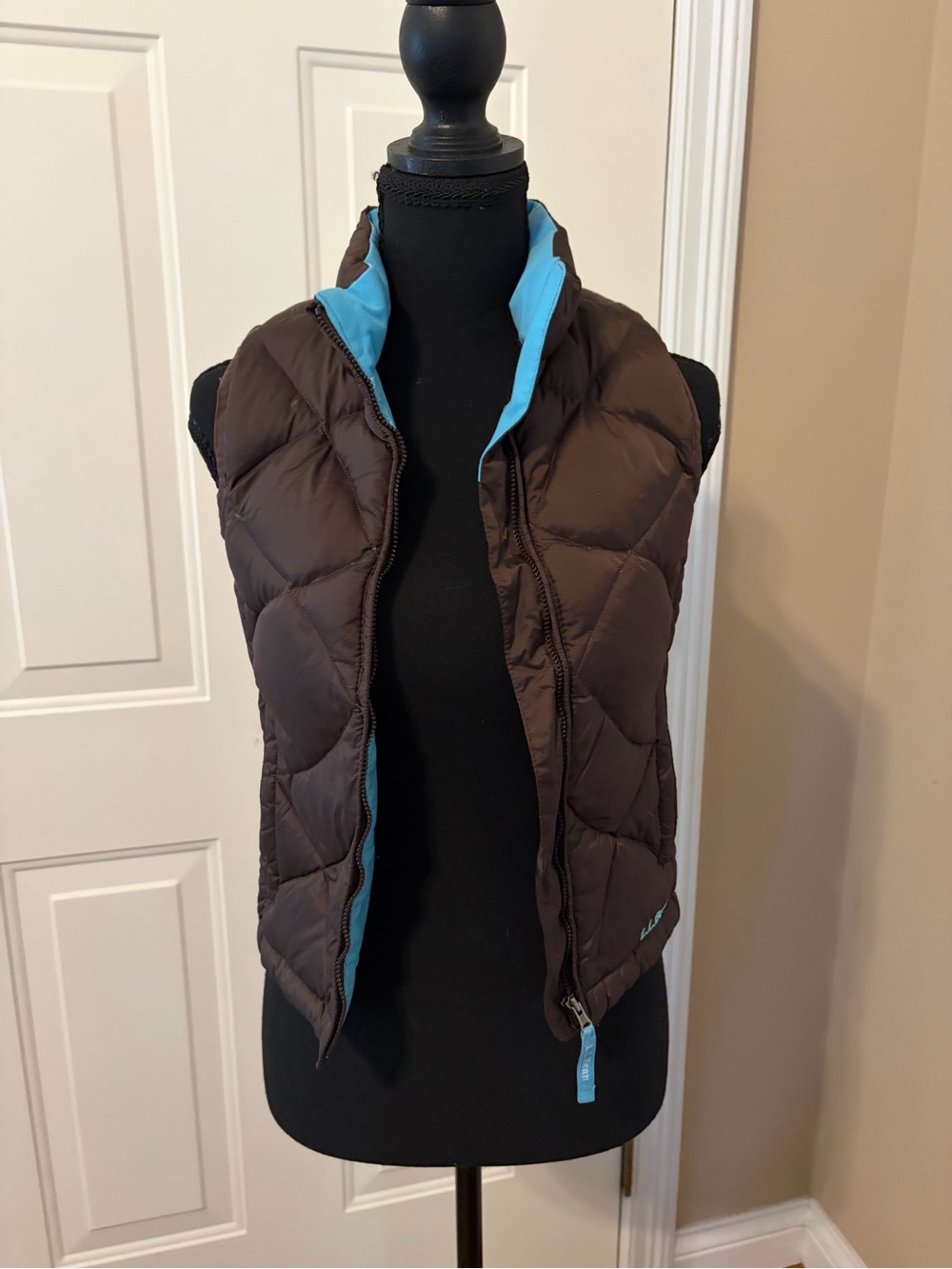 L.L. Bean Brown Puffer Vest with Blue Lining. Girls size L (6X/7)